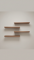 Custom floating walnut shelves